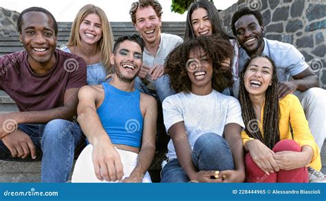 Happy Multiracial Group Of Diverse Friends Hang Out In The City Stock