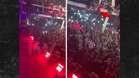 TRAVIS SCOTT FANS JUMP OFF BALCONY Crash Land In Mosh Pit