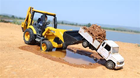 Bolero Pickup Stuck In Highway Pit Pulling Out JCB 3DX Tata Ace