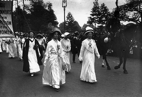 Emmeline Pankhurst leads a suffragette parade through London, with the ...