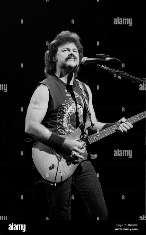 Doobie Brothers Guitarist Tom Johnston Is Shown Performing During A