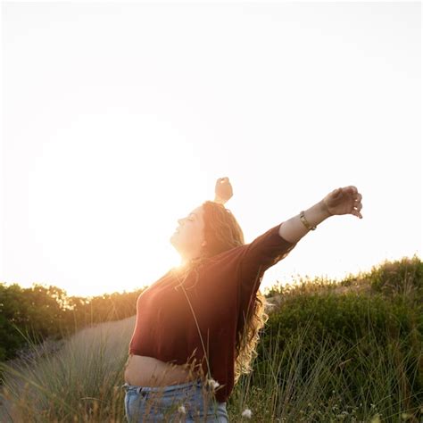 Free Photo Side View Of Happy Carefree Woman In Nature