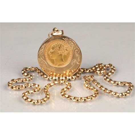 A Victorian 1871 Gold Sovereign Mounted To A 9 Carat Gold Circular