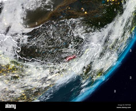 Bhutan From Space On Planet Earth At Night With Visible Country Borders