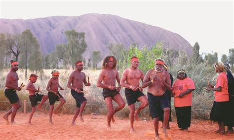 Celebrations at Uluru after climbers permanently banned - Newspaper ...