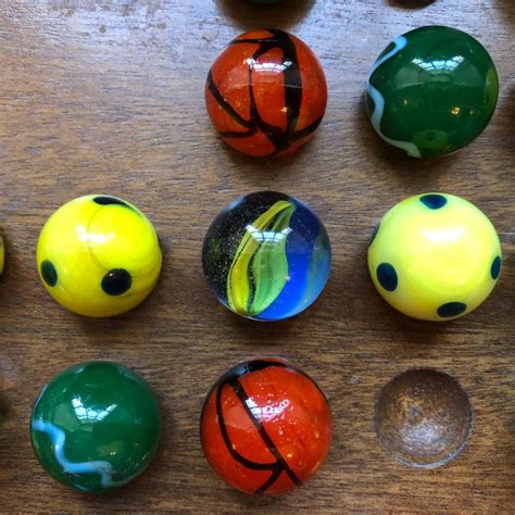 Solve Marbles On A Board Jigsaw Puzzle Online With 64 Pieces