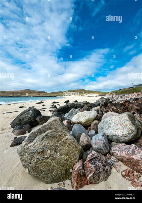 Pebbles Boulders And On The Remote And Beautiful Deserted Beach At