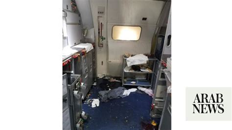 Passengers Attendants Subdue Man Who Tried To Open Exit Door Of China Bound Flight Arab News