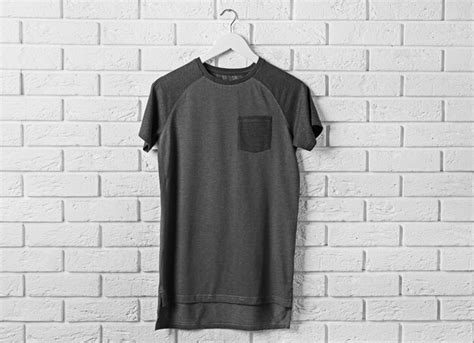 Premium Photo Blank Dark Tshirt Against Brick Wall