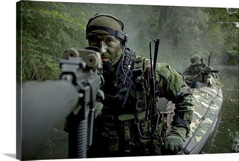 Navy Seals Navigate The Waters In A Folding Kayak During Jungle Warfare