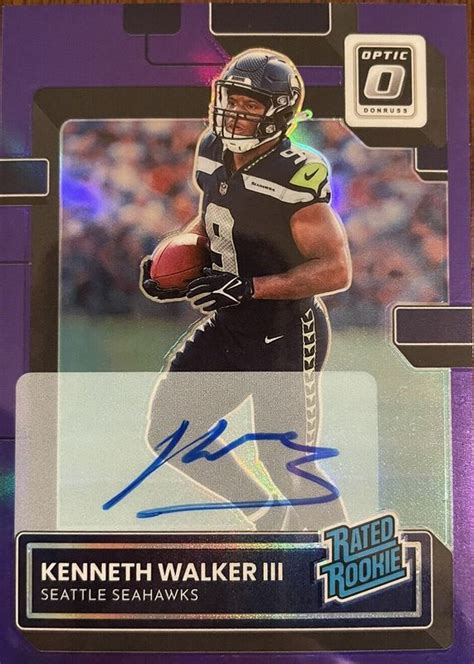 Kenneth Walker III 2022 Optic 218 Rated Rookie Autographs Purple 35