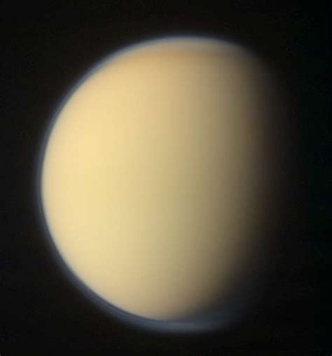 Global color view of Titan with a polar hood… | The Planetary Society