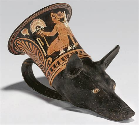 An Apulian Red Figured Rhyton Circa 340 Bc Molded In The Form Of The