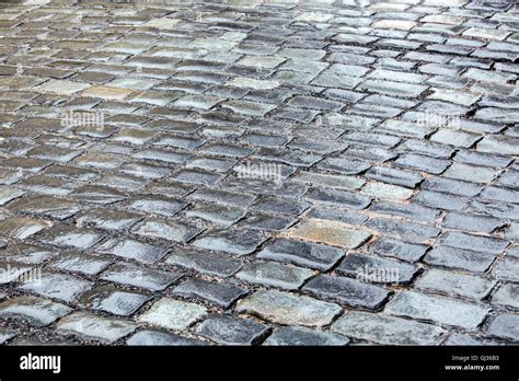 Dark Gray Cobblestone Street Pavement Fotos Und Bildmaterial In Hoher