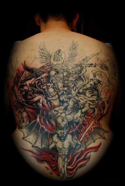 Battle of angels and demons tattoo on whole back - Tattooimages.biz