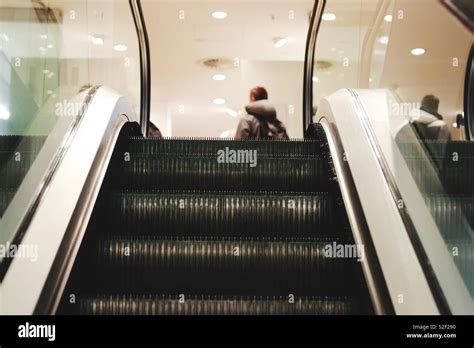 Escalator in shopping mall Stock Photo - Alamy