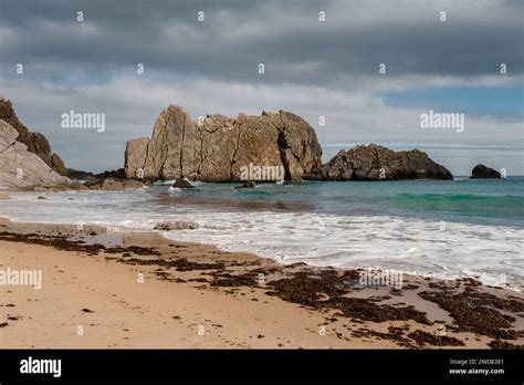 Sea Stacks In The Arnia Beach Also Known As Playa De Los Farallones