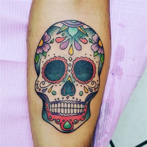 27 Colorful Sugar Skull Tattoo Designs And Meanings Tattooswin