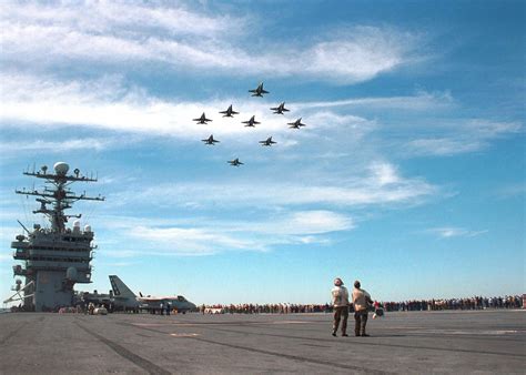 Aircraft Carrier Conducting a Flyover | Aircraft carrier, Navy aircraft ...