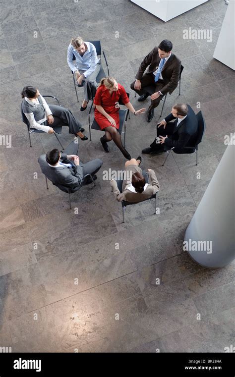 group of people sitting in circle Stock Photo - Alamy