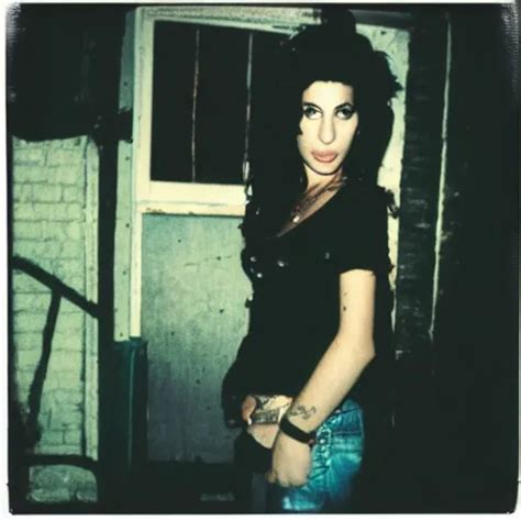 Polaroid Of Amy Winehouse On A Rainy Night In The East Stable Diffusion