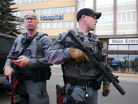 Calgary Canada Tactical Officers Securing The Entrance To A Hospital