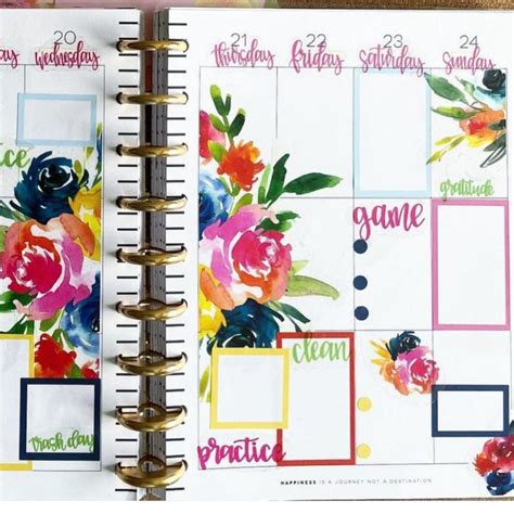 An Open Planner Book With Flowers On It