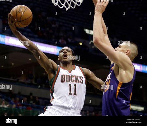 Milwaukee Bucks Brandon Knight Shoots A Layup Against Phoenix Suns