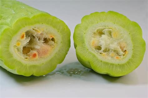 Bitter Gourd Fruit Chinese Cultivar Cut In Half Against White