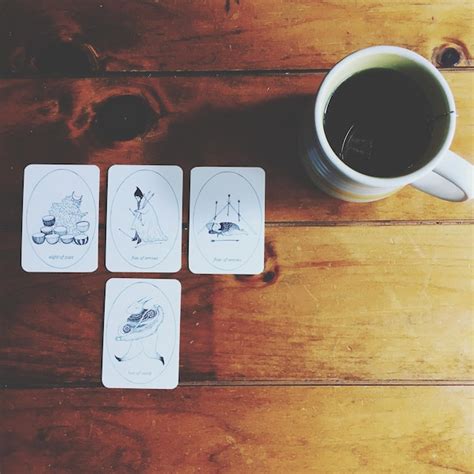 Premium Photo Directly Above Shot Of Tarot Cards And Coffee In Cup On