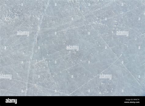 Ice background with marks from skating and hockey. Ice hockey rink scratches surface Stock Photo ...