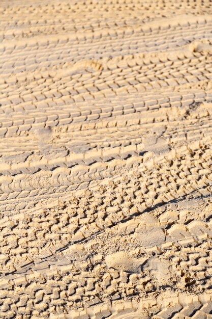 Premium Photo Full Frame Shot Of Tire Tracks On Sand