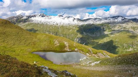 Greilkopf Idyllic Alpine Lake With Panoramic View Of Majestic Snow