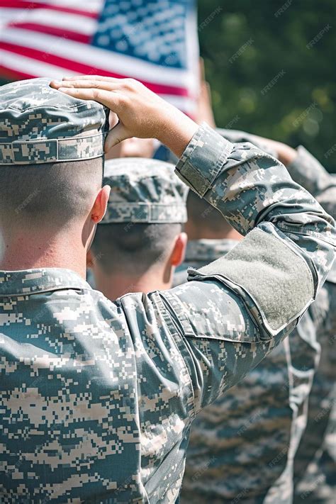 Premium Photo | A group of soldiers saluting the american flag