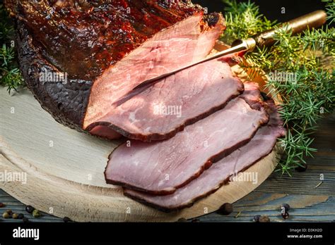 Juniper And Fresh Sliced Smoked Ham Stock Photo Alamy