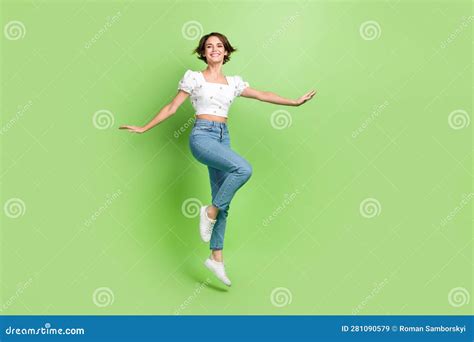 Full Body Portrait Of Cheerful Excited Lady Jumping Have Good Mood