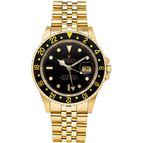 Pre Owned Rolex Black 18k Yellow Gold Gmt Master Ii 16718 Men S