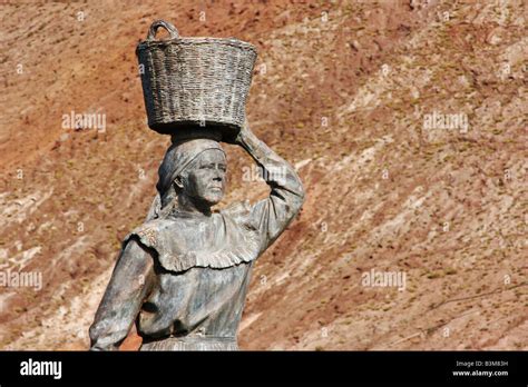 Statue Of Woman Carrying Basket On Head In Galdar On Gran Canaria Stock