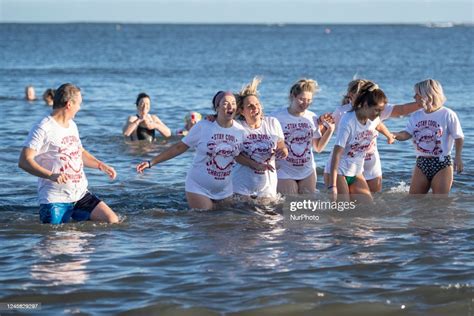 Annual Boxing Day charity dip in the North Sea at Redcar in England ...