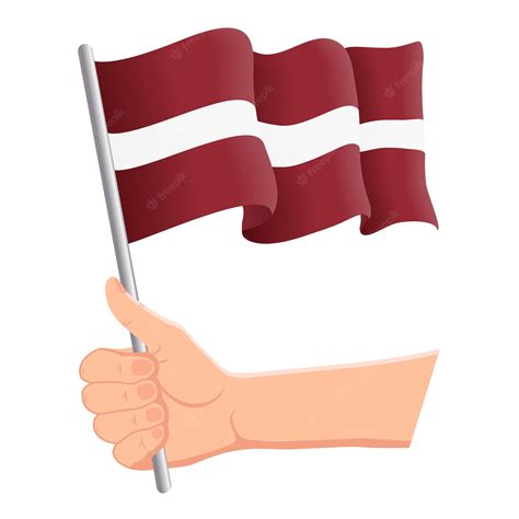 Premium Vector Hand Holding And Waving The National Flag Of Latvia