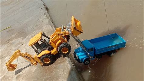 Jcb Mini Tractor Dumper Truck Stuck In Mud Pulling Out John Deere