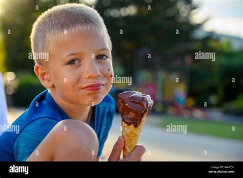 Bright Summer Portrait Of A 6 Years Old Naughty Blonde Haired Caucasian