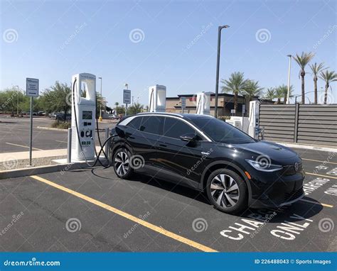 Electric Car Battery Charging Editorial Stock Photo - Image of ...