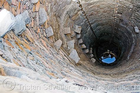 Deep Water Well With Stone Steps