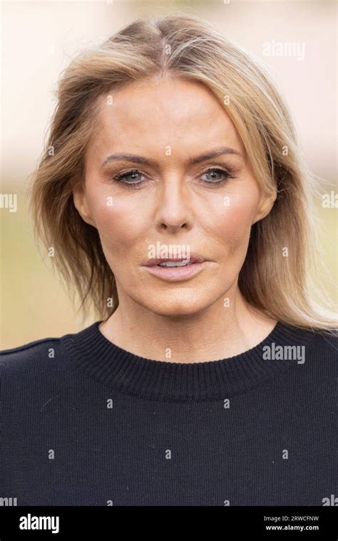 patsy kensit poses  photographers  arrival   burberry