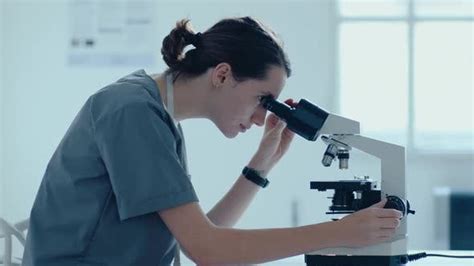 Female Scientists Conducting Research With Microscope In Laboratory Medical Stock Footage Ft