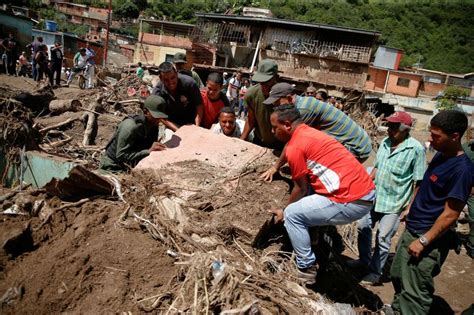 Equipes De Resgate Procuram Desaparecidos Em Enchentes Na Venezuela