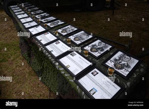 A Memorial Of Photos And Stories Of The Fallen Is Displayed At The