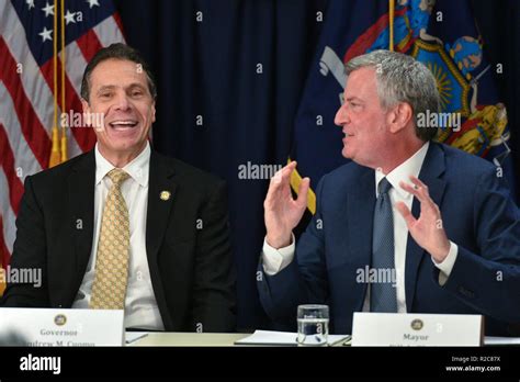 New York Governor Andrew Cuomo L And New York City Mayor Bill De