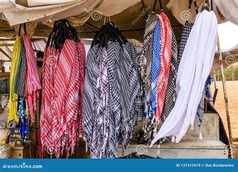 Different Keffiyeh Traditional Arabian Headdress For Sale In A Street